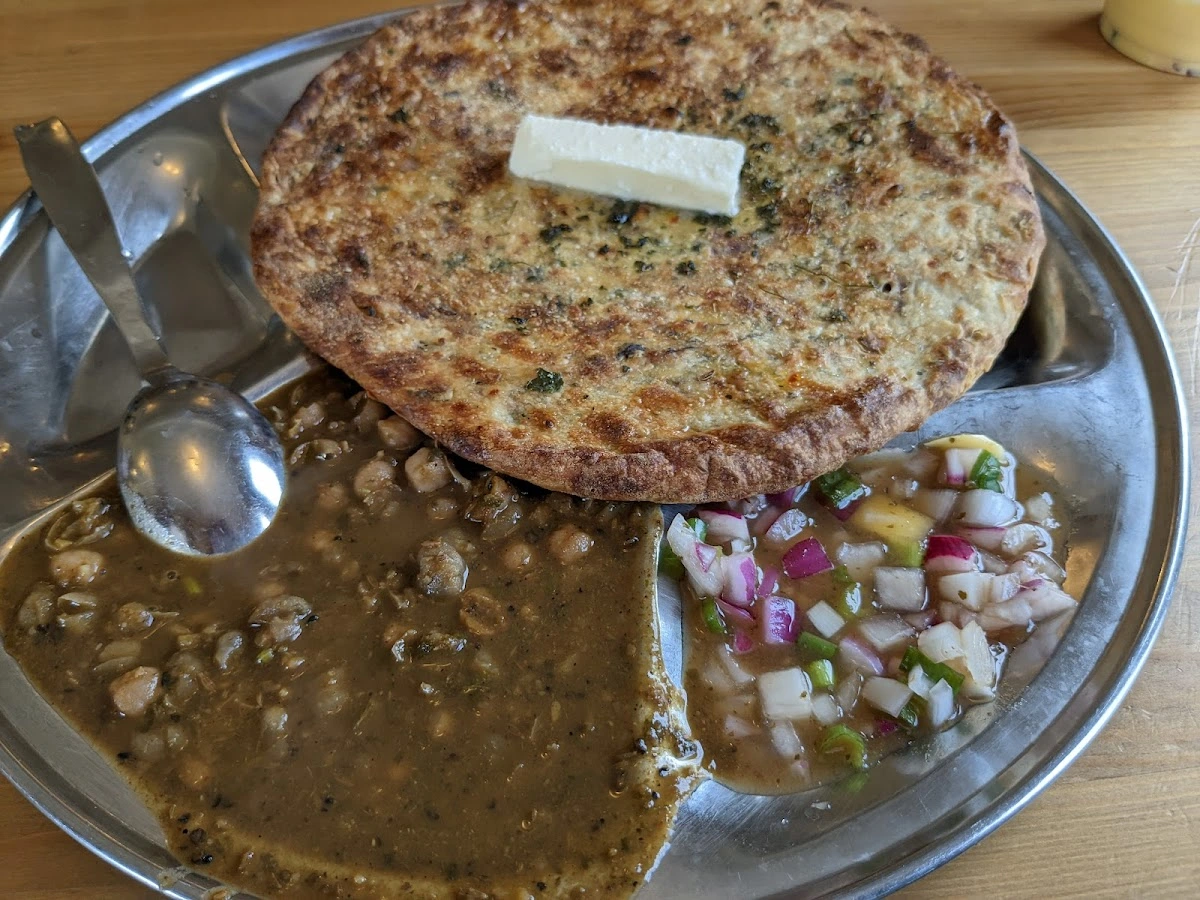 Amritsari Masala Kulcha with traditional Punjabi spices at Amritsari Kulcha Point