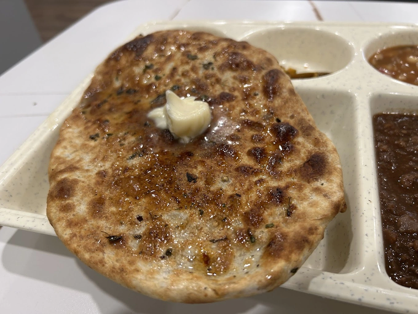 Aloo Kulcha - Classic potato-filled kulcha at Amritsari Kulcha Point Winnipeg